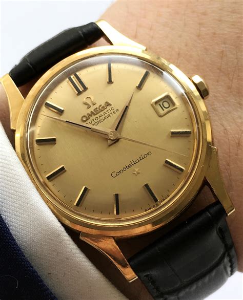 omega constellation gold